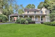 Nestled on over an acre of private, flat, treed property within the superb Clarkstown School District, this timeless gem offers authentic Victorian farmhouse style. Recently updated to include a new roof (June 2024), refinished huge wrap around porch floor and outdoor lighting, this home, with its rare porte cochere, exudes charm. Stepping inside to the central foyer, find abundant period details and modern comfort: substantial woodwork, built in storage, a decorative fireplace, pocket door and wood floors throughout the main level alongside multi-zone heating and 2 zone central cooling. The elegant formal dining room and sizable living room maintain their original wavy glass windows, while custom Marvin windows and stained glass round out views of the spectacular property. The kitchen offers stainless steel appliances, significant cabinet space, and recessed lighting while an adjacent breakfast room and warm family room showcase amazing views to the vast back yard. An updated full bath completes the first floor. Ascending to the second floor, an extension added in 2003 expanded the primary bedroom with a full ensuite bathroom and walk-in closet Two additional bedrooms with large closets and a den, currently used as a 4th bedroom, offer flexibility. An additional full bathroom on this floor features radiant heated flooring ensuring comfort. Outside, an invisible fence encloses the entire property keeping pets safe, while the original carriage barn offers two floors of storage for equipment or your vehicle. Enjoy the delightful bluestone patio for private outdoor dining and entertainment on pleasant days and rely on the automatic generator to keep the home running smoothly during inclement weather. There is a stone smokehouse/outbuilding in the backyard The unfinished basement offers additional storage space and a laundry area. 20 minutes to GW bridge and only 10 minutes to the Mario Cuomo Bridge.  Don&rsquo;t miss the opportunity to tour this fabulous home and make it your own!