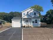 NOT MANY NEW HOMES BEING BUILT IN CENTER MORICHES. SPECTACULAR NEW COLONIAL WITH HARD WOOD FLOORS THROUGHOUT. CUSTOM MOLDING AND C.A.C. WHITE SHAKER SOFT CLOSE CABINETS WITH QUARTZ COUNTERTOPS AND STAINLESS STEEL APPLIANCES. 3 BEDROOMS AND 2 FULL BATHROOMS. FULL BASEMENT WITH OUTSIDE ENTRANCE AND EGRESS WINDOW. ATTACHED GARAGE AND MORE!