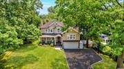 Magnificent Move-In-Ready Beacon Hill Beauty! Set of a stunning manicured 1/2 acre, this captivating 5 bedroom, 4.5 bathroom home with exceptional curb appeal and charming rocking chair front porch, is truly the one you&rsquo;ve been waiting for. Step inside to discover gracious principal rooms and an inviting, easy-flowing floor plan, perfect for entertaining. The chef&rsquo;s kitchen features brand new stainless steel appliances, abundant custom cabinetry, a wet bar, and sliding doors that lead to a new Trex deck and private yard. A few steps from the kitchen you&rsquo;ll find an incredible den with cathedral ceilings and doors to the yard, an additional bedroom/office, mudroom and access to the 2 car garage. On the bedroom level, there are three generous bedrooms, including a junior suite with full bath, and an additional full bath. The top full floor primary suite is a true retreat, featuring accordion-vaulted ceilings, an office/sitting room, two walk-in closets, and a luxurious spa-like bathroom. Additional highlights include a full house generator, lower level recreation with laundry and full bath, central air, in-ground sprinklers, and more. Prime location for easy access to town, trains, shops, and schools. Association beach (with applicable fees). A must see home!