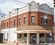 Income property. Mix use and beautifully maintained property. New Roof and fully renovated unit. First Floor: Liquor store and office (Lease) Second Floor: Two apartments. Unit one is rented with no lease and unit two is vacant.