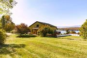 Fantastic Hudson River and Catskill Mountain Views. Property updated and renovated in 2000-2004. Sited on a hill above the river, this property offer 2.3 Acres in the hamlet of Cheviot. Cheviot offers a Boat Launch, Parking Area and the Hudson River. The rear of the house faces the river and mountains with unobstructed views from the Living Room with 2 Porches, Kitchen and Dining Area plus a 2nd Floor 850 sq.ft. Primary Bedroom with Bath. 2 Additional Bedrooms on the First floor. Wide Board Oak Floors, Floor to Ceiling Windows, Owned Solar System. Top Line Mechanicals and a Spacious Basement, Workshop and Garage.