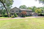 This stunning four bedroom home in the Smithtown School District offers a perfect blend of elegance and functionality. Nestled on a horse property with direct access into Blydenburgh Park riding trails, this home is a dream for equestrian enthusiasts. The property features four spacious bedrooms including a master suite with a Juliet balcony overlooking the serene yard. Cozy evenings can be enjoyed by the fireplaces in the primary suite and formal dining room, as well as the wood-burning stove in the living room. The kitchen is equipped with stainless steel appliances, double oven and warming trays. A family room and a large mudroom provide ample space for everyday living. The home also includes a full partially finished basement with both inside and outside access. Main laundry is located on the second floor. Additional amenities include a 2 car attached garage and a circular driveway. The property is fully fenced including the front yard, ensuring privacy and security. The beautifully landscaped grounds feature two gazebos and a pond. For horse lovers the property boasts a 4 stall barn, paddocks and a riding ring. The roof and heating system were updated as part of a comprehensive renovation in 2005. The home features hardwood floors and laminate floors and is freshly painted with new laminate flooring in 3 bedrooms. This property combines luxury living with the tranquility of nature in the sought after Smithtown school district. Don&rsquo;t miss the opportunity to own this exceptional house. Taxes are being grieved and expected to go down significantly.