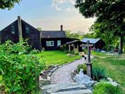 Charming 1850s Farmhouse with Barn in Beautiful Westtown, NY. Discover the charm and potential of this historic 1850s farmhouse, nestled in the picturesque countryside of Westtown, NY. This owner-occupied unique property offers a blend of rustic charm and endless possibilities for those with a vision for restoration and a love for the land. The three bedrooms and 1 &#189; baths provide a canvas for your dream home restoration. Original details throughout the house, including one functioning fireplace with pot hangers, add to its timeless appeal. The Two-Story Barn: Perfect for storage, workshops, or even a creative studio space, this barn adds utility and character to the property.Expansive 2-Acre Lot: The professionally landscaped grounds offer ample space for gardening, outdoor activities, and even a potential farm stand. There is plenty of room to cultivate your garden, and this property is ideal for those looking to embrace a sustainable lifestyle. Enjoy the tranquility of rural living while conveniently located near local amenities and attractions. This farmhouse is a rare find with incredible potential. Whether you want to restore a piece of history or create your idea of a modern farm retreat, this property offers the perfect starting point. Call today for your viewing.