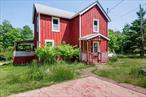 Own a slice of heaven at 414 Davos Rd! * Mountain views * Heated Inground pool!* Additional lot included in sale for guest house/pool house/room for expansion * Very Low Taxes! * This old style farmhouse sits atop a hill overlooking the refreshing pool & a gorgeous backdrop of the Shawangunk mountains. The yard is filled with fruit trees and a variety of blossoming flowers throughout the summer. There is a structure with electric that could be used as a workshop, a garage for small vehicle/lawnmower/ATV, or a man-cave. There is a covered porch that wraps around half the house making it great to enjoy the outdoors rain or shine. Inside, there is a recently renovated modern style kitchen complete with a coffee bar and stainless appliances. The living room has a Harman pellet stove which warms the home efficiently in the winter months. Work from home potential with two smaller rooms on the first level that could be utilized as offices. This property is a short drive from highway 17 and just 90 miles from NYC. A popular vacation destination, Rock Hill is home to a wide variety of outdoor activities, including running, bicycling, swimming, boating and skiing. There are many lakes nearby to enjoy in the summer months and restaurants with waterfront dining. Take advantage of being close to the amenities of the Catskills such as Bethel Woods Center for the Arts, Resorts World Casino & Kartrite Water Park, and Holiday Mountain. This home will feel like a relaxing getaway any time of year.