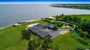 Waterfront! Relax In Privacy In This Secluded, Oversized 7000 Sq. Ft. Bay Front Ranch With Large 2 Car Garage. Gorgeous, Heated Igp And 250 Ft. Of Bulkhead With Electric Boat Lift & Large Cut In For Boat. Islip Schools. Iconic Views Of Great South Bay In A Classic, Resort Like Setting.