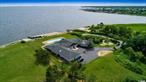 Waterfront! Relax In Privacy In This Secluded, Oversized 7000 Sq. Ft. Bay Front Ranch With Large 2 Car Garage. Gorgeous, Heated Igp And 250 Ft. Of Bulkhead With Electric Boat Lift & Large Cut In For Boat. Islip Schools. Iconic Views Of Great South Bay In A Classic, Resort Like Setting.