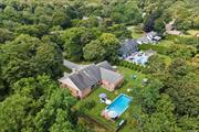 Discover a unique opportunity to own a well-maintained brick and stucco home in the desirable North Haven community. Set on a spacious 1.18-acre corner lot, this property offers the potential to add a tennis court, pickleball court, and pool house. Located just a few blocks from a private bay beach and minutes from Sag Harbor Village, Foster Memorial Beach (Long Beach), the Shelter Island Ferry, and about seven minutes from the ocean, this home lets you enjoy the best of Sag Harbor all year round. This 2, 000+ square foot home features three bedrooms and two full bathrooms. The living and dining areas have 10-foot high ceilings and plenty of natural light, making them perfect for entertaining. The interior includes hardwood floors, central air conditioning, a laundry room with storage, an inground pool with a patio, an irrigation system, a bluestone driveway, a two-car attached garage, a full unfinished basement with seven-foot ceilings, and a full attic. The living room has a wood-burning stone fireplace with a bluestone mantle, adding charm to the space. Multiple sets of double French doors in almost every room provide fresh air and sunshine, connecting the indoor space to two large outdoor covered patio porches. These outdoor areas are perfect for dining or relaxing by the pool. The kitchen has new high-end Bosch appliances, granite countertops, two large pantries, and plenty of storage. Its open layout makes it easy to move between the kitchen, dining, and living areas, creating a great environment for entertaining. The three bedrooms are bright and spacious, each with double French doors. The primary bedroom includes a walk-in closet, skylight, and an ensuite bathroom with a Jacuzzi tub. Additionally, there is an excellent opportunity for investors to buy and build a luxury property. The village of North Haven has potentially approved plans for a tennis court and a potential 6, 000 square foot home, making this property even more valuable and versatile.