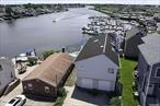 Location, Location! CASH ONLY......PROPERTY IS BEING SOLD AS IS w/OPEN PETMITS. BOAT LOVERS DREAM COME TRUE. FABULIOUS VIEW OF OPEN BAY. Buyer Must Do Their Due Diligence. 40 Feet of New Bulkhead with Open Access to The East Rockaway Channel. Large 2 Story Home with Attached 2 Car Garage and Oversized Driveway. Tremendous Opportunity to Own Uniquely Located Home on The Water. Renovate Your Luxury Home. Un- Obstructed Views From Both Floors of Miles of Open Bay. Oversized 3 Bedroom. Open Floor Plans with Focused views of the Channel. Vaulted Ceiling, Skylights, A Must See! This is a Unique Opportunity to Own a Fabulously Located Waterfront Home.