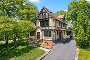 Centrally located steps away from the heart of Downtown Kingston sits a charming and well-maintained Tudor home offering tons of character and history. Sited beautifully on a hill set back off the pavement brings you privacy and convenience. Step inside to a bright and open floor plan that flows nicely together making this the perfect setup for entertaining guests/family gatherings. The main level features a spacious living room with a cozy fireplace, dining area, eat-in kitchen with stainless steel appliances, and lovely family room that all blends nicely together. The kitchen has been tastefully updated with granite countertops, custom cabinets, newer stainless-steel appliances, and tile backsplash. The grand +/- 4, 652 sq. ft. home has a total of 6 bedrooms and 4 full bathrooms with an abundance of natural sunlight and hardwood floors throughout. Enjoy easy living with a laundry room, primary suite, bedroom, and two full bathrooms on the first floor. Elevate to the second level from the custom wood staircase featuring four more bedrooms and two full bathrooms. There is also another small room that can be used as an office/walk-in closet. Don&rsquo;t miss the attic that is finished with 3 additional rooms and a Juliet balcony to sit and enjoy your morning coffee on! Ample-sized rooms and a wonderful floor plan make this the perfect place to call home. The property is nicely manicured with a stone patio, screened-in gazebo, off-street parking for + 5 cars, and a three-car garage with a separate basement for additional storage. All this is within walking distance to coffee shops, local eateries, farmers market, museums, galleries, parks, marinas, the new rail trail, (hot spot Hutton Brickyard) and all that Downtown Kingstons Waterfront has to offer while just under two hours from NYC. This home is a must-see!