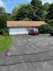 Cute ranch on 2 acres with a BOHA buildable lot for 3 bedroom home. Live in one while you build your dream home. The house site and cottage are in Danbury and mailing address and driveway access are in NY. Great potential and income producer.