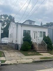 ***ATTENTION INVESTORS & END USERS -***LOW TAXES***- Village Of Valley Stream And School District - Great Starter Home - Will Need TLC - Quaint Two-Level House Situated On A Large Property - Four Bedrooms - Two Full Bathrooms - Kitchen - Dining Room - Living Room - Full Finished Basement - Gas -