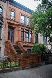 Welcome to this attached single-family, three-story home in the desirable Prospect Lefferts Gardens Historical neighborhood of Brooklyn. You will appreciate the home&rsquo;s charm, located on Brooklyn&rsquo;s greenest tree-lined block, this home is overflowing with stunning details from top to bottom, from the spacious interior with Private Backyard to the facade. This home offers approximately 2700 sq ft. 3 Bedrooms, 2 Full Baths with a spacious media room to entertain family and guests, in a newly renovated kitchen.  Prime Location with Great Transportation. 125 Midwood Street offers convenient access. The property is ideally located close to Prospect Park and Zoo, Prospect Botanical Garden, an array of restaurants, cafes, and the best nightlife Lefferts Gardens has to offer. Walk to the B/Q express, 2, 5 train, and numerous MTA buses. Scheduled appointments only!  This property has something special for everyone. Sold AS-IS.