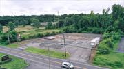 CLEAN COMMERCIAL LOT-OM ZONING-OFFICE & MANUFACTURING!About 1 acre On Main Road-Hurley Ave & 205 FEET Of ROAD FRONTAGE ON HURLEY AVE.Not Many CLEAN Commercial Lots there.FORMER Citgo GAS STATION.All Tanks Removed/Cleaned up. ZONED FOR GAS STATION/HEAVY COMMERCIAL/BANKS/RETAIL/CAFE/FAST FOOD-MOST BY RIGHT-Not Special Use required.Next door to major Project going underway at Former High School-RECENTLY SOLD FOR ABOUT $3 Million.Heres your opportunity to build your business for Much Less without demolition costs/hassles without operating such a large project.All traffic coming from there to your Business idea-Before someone else, on Border of Kingston!Why bother buying an old building that needs to be demolished or renovated, when a Clean Commercial Lot w/2 Curb Cuts waiting for your Idea-for under a Million!You can build up to 7 Stories high!Large existing sign-Ready for your Business.Property Taxes-$8500 Office Trailer is on wheels&will be removed by sale.CALL 516#or SHOWINGTIME FOR APPTS