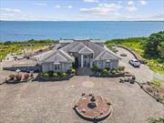 Experience the ultimate in serene waterfront living with this nearly 8-acre custom-built residence on the Great South Bay. This unique 5-bedroom, 2.5-bathroom home offers a perfect blend of luxury and comfort, featuring nearly 3, 600 square feet of beautifully designed living space. Enjoy the convenience and privacy of a main-level master suite. Custom-built kitchen and formal dining room perfect for everyday meals and grand gatherings. Cozy up in the inviting family room with a fireplace, or unwind in the additional living room also featuring a fireplace. Versatile loft area or family room with a stunning spiral staircase leading to the crow&rsquo;s nest, where you can enjoy panoramic views. Plenty of room for guests or staff accommodations. Comfort year-round with central air and ample storage space. Outdoor living made easy - Relax and entertain in your private in-ground pool. and Outdoor Shower, Conveniently located for a refreshing rinse after a swim. Custom Moldings Throughout, Exquisite craftsmanship and attention to detail. This one-of-a-kind property is not just a home; it&rsquo;s a lifestyle. Don&rsquo;t miss your chance to own a piece of paradise on the Great South Bay