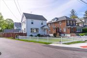 Beautiful single-family home in Beechhurst! 4 bedrooms, 3.5 baths, hardwood floors throughout. Basement with separate entrance. First floor: living, dining, kitchen, and bedroom suite. Second floor: 3 bedrooms, full bath. Finished attic with bath. Close to transportation.