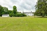 In 1912 Senator J. Griswold Webb built this majestic six-bedroom, six-bathroom colonial with five fireplaces that now sits on fifteen glorious acres. It could now be transformed into a Bed and Breakfast. This stunning true center hall colonial has front and rear doors with a beautiful archway. The formal dining room has a glass built in cabinets, a fireplace, and a hidden floor to ceiling safe. The generous sized main rooms have hard wood floors throughout, original detailed millwork, and plaster walls. The well-appointed rooms have tall ceilings, and the abundance of windows and French doors give the interior rooms extraordinary light. The living room has original glass built in bookcases and a fireplace. The study has oak built in bookcases and the full bathroom has splendid marble and tile. The enclosed porch off the living room runs the width of the house and has the original windows and doors. The jade colored tile floor is exquisite and the oversized stone fireplace is perfect for large gatherings on cool nights. The kitchen is sizable, quite suitable for a house of this size. This is a marvelous house for entertaining family and friends. The primary bedroom is on the second floor with an en-suite full bathroom, fireplace, walk in closet and dressing room. There are two additional full bathrooms that service the other four bedrooms. One other bedroom has a private entry, dressing area and fireplace. There are two additional rooms, that at one point were servant&rsquo;s quarters and could be used for storage, or large closets. The unfinished lower level has tremendous potential. It has several rooms, a wine cellar, cedar closet and another floor to ceiling safe. The old billiard room with its stone fireplace could be restored to its former glory. The house is a two-family residence. There is a two-story guest wing with a fireplace, separate entrance, kitchen, three bedrooms and three bathrooms. Ideal for guests, in-laws or for use as a rental property. Additionally, there is a 1500 square foot barn and three car detached garage. Very few houses remain in the county like the Beck House with unspoiled original details from this by gone era. The land boasts mature landscaping, ancient lilac, and magnolia trees in addition to other specimen trees. Originally a Guernsey farm, it was leased by Jack Dempsey&rsquo;s trainer as a training camp for the prize fighter prior to the building of the great house. This property is in the Millbrook School District., AboveGrade:5885, Below Grnd Sq Feet:250, ExteriorFeatures:Landscaped, FLOORING:Tile, Wood, InteriorFeatures:Walk-In Closets, Other School:DUTCHESS DAY, ROOF:Asphalt Shingles, Unfinished Square Feet:250