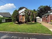 Fixer upper needs extensive renovations. Brick home with a full basement with detached one car garage.