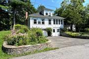 Situated in the riverside hamlet of Rhinecliff, this two bedroom c1940 bungalow retains many original elements. Beautiful hardwood floors, beamed ceilings, wood trim, and ample light delight throughout. The first floor consists of the kitchen, living room, bedroom, full bath and a large room with a wood stove. Upstairs the second floor is one large studio space currently serving as the second bedroom. At ground level find a generously-sized garage with laundry. A private back deck accessed via French doors from one of the main living rooms, overlooks a small pond and mature landscaping. New roof and furnace. Partial river view expands with the seasons. Walking distance to the Amtrak station, the Rhinecliff dock and boat launch, and only a three minute drive to the center of Rhinebeck Village. Additional Information: HeatingFuel:Oil Above Ground, ParkingFeatures:2 Car Attached,