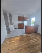 2 Bedroom Apt Close 1 one Block From 7 Train Station 111st. Recently Renovated, second floor apt All utlities included. Available ASAP.