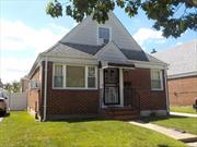 Well maintained Brick Cape, Close to all, 4 Bedrooms, Updated windows, roof, kitchen and bath, 100 amp electric, Spacious fenced yard, 1 car garage with storage. Steps to bus, shopping and schools. Favorable R3X zoning offers great potential for expansion / 2 family conversion, check with NYC DOB