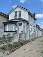 This property is a residential / commercial flex property on Crossbay Blvd. 2 bed/ 1 bath/ garage and 1/2 finished basement Solar panels, tile floors on 1st floor., Additional information: Interior Features:Lr/Dr