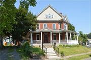 See the best of the past and present in this stunning, one of a kind, FULLY RESTORED 1880 Queen Anne Victorian! Solid and stately, it has been renovated with modern amenities while retaining its original details and character. The exterior charms with intricate woodwork, a grand WRAP-AROUND PORCH with ornate columns, and colorful stained-glass windows. As you cross the threshold, the foyer highlights a majestic staircase adorned with detailed woodwork. The living room beckons with an inviting WOOD BURNING FIREPLACE and picturesque bay window that allows for natural light and a seasonal river view. This space seamlessly transitions into a huge, gourmet kitchen! It is complete with brand new LG Energy Efficient Stainless-Steel Appliances, sleek Quartz Countertops, a Fire Clay sink, soft close cabinetry and an enormous center ISLAND that serves as a BREAKFAST BAR. There is also room for a cozy, duo dining table here as well. You will also find a dining room area that walks out to the back yard, a pantry with a butcher block countertop and a half bath on the main level, too. Ascend up the stairs to the second floor where there are three roomy bedrooms with closets, a luxurious full bathroom with a jetted whirlpool tub, and the convenience of having a designated laundry room on this level. There is a walk-up, insulated attic with windows that could serve as another level of living. The full basement has plenty of storage space and walks out to the back yard area. Step outside to find a landscape that is complete with vibrant flower beds, a fire pit area, shed, and a spacious patio area that offers the perfect spot for dining al fresco & entertaining. This TOTALLY TURN-KEY Victorian home blends old world charm with contemporary luxury...offering a unique living experience that celebrates the best of both worlds! Located in Kingston&rsquo;s up-and-coming Ponckhockie neighborhood, it is just a stroll from the quaint stores and restaurants in the popular Rondout Historic Waterfront District, the Kingston Point Beach, the Empire Rail Trail & the trendy new bar Sorry Charlie. Easy access to the NYS Thruway and less than a 2-hour drive from NYC.