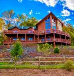 Contemporary Log Home in the Catskills!!!Charming 4 Bed/5 Bath Home-Million Dollar Views & Guest House with 2 Bedroom/1 Bath & Kitchenette.Custom Oak Kitchen Cabinets with Glass Inserts, Granite Counter Tops and Island, Stainless Steel Appliances & Ceramic floor.Family Room has open floor plan/ Dramatic 30 Foot Ceiling/Wall of windows, Natural lighting, Skylights, 2 slider doors lead to Deck and cozy Fireplace.1st Floor bedroom, Master Bedroom has sitting area & access to Sauna Room, Fireplace, Cedar walk in closet, Spa Bath all Tiled, Slider access to deck.Brazilian Wood Floors, Custom log railings, Recessed lights/Ceiling Fans, Ductless A/C units, 3 Jacuzzi Tubs, Generac Generator. 2 Tier deck with outstanding views, Back of home has multiple decks and sitting areas with a screened in Room with kitchenette. Basement has Full Bar with slider leads to deck.4 Car garage, Vegetable Garden, Apple/Peach Trees, Grape vines & Raspberry Bushes.15 Miles to Casino/100 Miles to NYC!!! Also an active Air bnb.