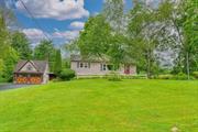 Situated perfectly amid alfalfa and hay fields, in the middle of farmhouses with generations of history and care, this solidly-built, well-maintained home in Olivebridge offers, comfort, value and affordability. 5013 Route 213 has two bedrooms, a den, large living room, dining area, as well as a generous eat-in kitchen. Additional details include hardwood floors, full home generator and large loft (storage, office, imagination room) in the primary bedroom. With garages for three cars, a separate finished game room (suitable for guests or office) and ample basement space for more storage and laundry, this checks all the boxes. Step outside on the backyard deck to enjoy dinner al fresco while enjoying the view of High Point mountain. Just up a country road to the Reservoir for sunset walks and dramatic vistas, and a short distance to Woodstock and Kingston. 5013 Route 213 is a great reason to call the Hudson Valley, Home.