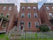 Welcome to you Hudson River view townhome fixer upper! Three apartments on a peaceful block that is tucked away between bustling Liberty St and other major commercial and residential developments. Needs work, but the building has great bones -- and views of the Hudson River!  Seller-financing is available.