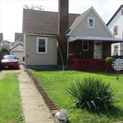 Great Starter Home In Bellerose, Queens. House is Situated Mid Block. One and half block from Hillside Ave. Close to shopping and public transportation. The House Features Living Room With Fireplace And A Large Eat-In-Kitchen With Sliding Doors Leading To Private Backyard and finished basement with 1/2 bath