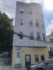 WONDERFUL OPPORTUNITY TO PUTCHASE THIS RENOVATED LEGAL 4 FAMILY HOME. ALL APARETMENTS ARE 2 BEDROOMS. FIRE ALARM SYSTEM IS CENTRALLY MONITORED. THE LOT TO THE LEFT IS INCLUDED IN THE SALE AND GENERATES $1600 MONTHLY