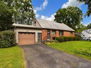 Charming well-maintained brick cape! Step inside this welcoming 4 bedroom, 1.5 bath home. The large living room flows nicely into the kitchen and dining area. There are two bedrooms and one full bath on the first floor with ample closet space. The large sunroom off the kitchen leads out to the backyard and attached garage. Elevate to the second level where you will find 2 more bedrooms and a bath, this area could easily be turned into a home office or private suite. The full basement is partially finished offering more room to hang out or for additional storage space. The property is nicely landscaped with a large one-car garage, and a large shed for storage. Conveniently located minutes to Uptown Kingston Stockade District, Downtown Waterfront, shopping, restaurants and so much more. Come take a look! Additional Information: Amenities:Storage, HeatingFuel:Oil Above Ground, ParkingFeatures:1 Car Attached,