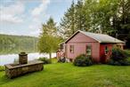 Unmatched 74-Acre Compound or Development Opportunity!! Just 2 hours from NYC, this extraordinary estate in the heart of the Catskills (Long Eddy, NY) offers the ultimate escape. Set on 74 idyllic acres, this rare property is a true gem, featuring stunning mountain views, a private 25-acre spring-fed lake, and endless opportunities for recreation and relaxation.With 2, 450 feet of lakefront, wooded trails, and streams, the estate provides a variety of outdoor activities, from hiking and kayaking to fishing. Whether you&rsquo;re paddling on the peaceful waters or exploring the nearby Delaware River, this property is a nature loverâ€™s paradise.The compound includes a three-story, two-family main house along with two charming, renovated cottages. The main house features two private entrances, spacious kitchens, a stone fireplace, a wood-burning stove, and a large screened-in porch, hardwood floors and views of the lake!! The two-bedroom cottages are equally inviting with cathedral ceilings, stone fireplaces, and screened-in porches, perfect for year-round living and offering stunning lake views.The boathouse, which includes a dock and storage space for kayaks, presents the potential to be converted into an artistâ€™s studio or additional guest house. Outside, the property is well-equipped for entertaining with a stone BBQ grill, a firepit, and play areas.Though secluded, the property is a short drive from the charming towns of Callicoon, Hancock, and Narrowsburg, known for their wineries, breweries, boutique shopping, and dining.This unique estate offers endless possibilities - a private retreat, an Airbnb investment, or a future development project, this property in the Catskills is truly one-of-a-kind. Additional Information: Amenities:Guest Quarters, ParkingFeatures:2 Car Detached,