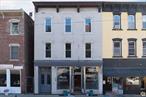 Don&rsquo;t miss this mixed-use building in Midtown Kingston, NY. A true gem in the vibrant community. Building is located steps away from City Hall and close proximity to Hospital. This prime location presents a fantastic opportunity for investors and business owners alike. The main level storefront offers an ideal space of 1, 440sf for retail or a boutique business. Features a full size, dry basement for storage. High visibility along Broadway ensures steady foot traffic and exposure. Back yard can be entered either from sidewalk or back of the store. Second and third floors each feature spacious one bedroom apartments. No expense spared on renovation, commercial space features accessible bathroom, new HVAC unit for heating and cooling, on demand hot water heater, upgraded plumbing and electric. Both apartments feature new hardwood floors, new bathrooms, split AC/ Heat units, custom kitchen cabinets with marble counter tops and stainless steel appliances. Currently commercial space has a tenant with 3 year lease. Both apartments are vacant.