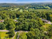 First time on the market in over 50 years, this exceptional 80, 150 sq. ft. residential lot in desirable Katonah has been owned by one family for decades. Located within the Somers School District, this prime property borders the prestigious AngleBrook Golf Club and is surrounded by beautiful homes on a quiet, tree-lined dead-end street. Build your dream home and enjoy the peace and tranquility of this serene setting, with the added bonus of the nearby Amawalk Reservoir, stocked annually with trout for fishing. Despite its secluded feel, the location offers easy access to NYC and major highways, making it the perfect blend of convenience and calm.