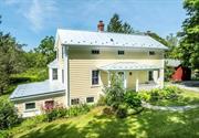 Quintessential Hudson Valley farmhouse situated on bucolic Bangall Amenia Road in Millbrook, NY. This period home is ready for the next steward to care for and enjoy this truly peaceful and stunning location on 7.12 acres. The charming eyebrow four bedroom homestead dates from 1870 with numerous recent renovations and improvements. The Hardie Board siding was done in 2023, along with metal roof w/ snow guards and attic rafters. New double-paned windows throughout. Brand new gutters, 2024. New blow-in insulation completed in 2023. The grounds and landscaping have been well maintained for years. The pond provides relaxation, recreation and nature. The barn has two levels with power hook-up available. Property includes Generator. The main level as you enter includes beamed ceiling Living Room w/ fireplace. Another Sitting Room with bay windows/seat and a bedroom with ensuite bathroom. The lower level includes another Living Room, Dining and renovated eat-in kitchen. Access to outdoor slate patio. The upper level includes Primary Bedroom, two other bedrooms and renovated bathroom. All of this is just two hours from NYC. Metro north train station minutes away. Welcome to the Hudson Valley.