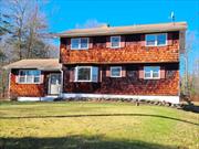 Discover this spacious 4 Bedroom, 2 Bathroom Colonial set on over 3 acres in Neversink! Nestled back from a quiet country road, this charming home offers privacy and picturesque surroundings. Inside, the two-story layout features 4 bedrooms, 2 bathrooms, a formal living room with a stone fireplace, a formal dining room, a family room, and an eat-in kitchen. The primary bedroom includes an additional space that was being prepared as an en-suite bath. Step outside to a generous deck, ideal for entertaining and relaxation, with views of an expansive, flat yard featuring a garden area perfect for outdoor sports, a play area, pet space, and endless possibilities. ConstructionDescription: Cedar, Shake Siding,