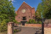 The Abbey, a majestic, 1930&rsquo;s brick church with 8000 sq ft, overlooks the beautiful Hudson River and is still just steps from bustling Warren Street in downtown Hudson, NY - recently called the coolest small town in America.&rsquo;&rsquo;  As you approach the Abbey through the large brick walls and custom electronic iron gate, you are swept away by the architectural beauty and grandeur of this property. In 2016, the current owner undertook a complete renovation - meticulously preserving every detail - from the original glass pendant lights to the gorgeous, original stained-glass windows which surround the main floor. Known as the Sanctuary, this room boasts 30-foot ceilings and has been thoroughly re-imagined while maintaining its pure elegance! You enter the large terrace from this floor which overlooks the property and beautiful, northern views of the Hudson River. The Bell tower also presents many options for future use.  Enter the lower level from one of the two staircases - which features a sprawling professional chef&rsquo;s kitchen with Blue Star appliances and a center island that seats 8 and opens to the large yard. Adjacent to the kitchen is a spacious great room, bracketed by original columns of wood and native stone - the space is perfect for dining and entertaining.  The one full bath and 2 powder rooms are fashioned with beautiful details. The nearly 1-acre property includes a vegetable garden, gorgeous mature trees, and a custom brick, lower terrace perfect for a fire pit and gatherings.  Create the most unique and incredible home in Hudson for you and your family! Or imagine it as a cooking school surrounded by the Hudson Valley&rsquo;s farms or a food television studio and even a music production studio, (the acoustics are professional grade). The Abbey would make for an amazing art center complex or museum, or a Zen meditation retreat. The possibilities are endless.  Beyond all that Hudson has to offer - the new Klocke Estates Distillery is only 10 minutes away; the future home of The Shaker Museum in Chatham is 20 min away and you can be in the Berkshires in 40 minutes. The Abbey is a quick stroll from the historic Hudson Amtrak station - just two hours to NYC and half hour to the Albany International Airport.