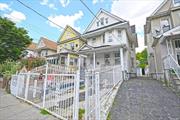 Spacious Legal Single-Family Home with Conversion Potential in Richmond Hill. Ideal for a large family, this four-floor legal single-family home in Richmond Hill features a private front parking area and a garage in the back for additional storage. The basement includes a legal bathroom, large family room, and a brand-new boiler, though it remains unrenovated. The first floor, which has been renovated, offers a bedroom, living room, eat-in kitchen, and a full bathroom. The second floor features three more bedrooms and a full bathroom, while the attic provides two spacious bedrooms. The property also includes approved plans to convert it into a two-family home, adding future potential to this well-appointed residence.