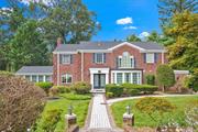 welcome to this 3, 200 sq ft Brick Georgian Colonial single-family home, with east and south exposure and a double parking garage, is situated on a picturesque winding street in Strathmore Vanderbilt, seamlessly blending sophistication with modern functionality. Fully renovated from bottom to top with new wiring, plumbing, heating, and cooling systems, the home features a newly installed kitchen with high-end appliances, all new windows, a finished basement with full bathroom, and a sunroom. The front-to-back foyer leads to a banquet-sized dining room and a formal living room, both adorned with exquisite moldings, columns, and a wood-burning fireplace, while the rear-facing kitchen boasts modern amenities and opens to a patio. The second floor offers a luxurious principal suite with a marble bath, three additional bedrooms, and a bath, all set on a beautifully landscaped 0.34-acre lot..,