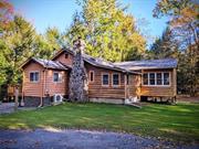 Looking for a peaceful retreat in the Catskills just 90 miles from the George Washington Bridge? This exquisitely recently renovated, turnkey home is nestled on a quiet street near a lake, hiking trails, and waterfalls in the charming hamlet of Smallwood. It has an easy to maintain open-concept design, and features a large, partially roofed deck for enjoying the outdoors, even on rainy days. A magnificent fireplace with an insert can efficiently heats the house besides the central heating. This three-bedroom home, complete with an office, is ideal for year-round living or as a vacation getaway.  Minutes from Lakeside Dining, Resort World casino, Bethel Woods Center for the Arts, and water parks, this home offers entertainment for every taste. It&rsquo;s perfect for year-round living or as a vacation getaway. Plus, with a track record as a successful short-term rental, it&rsquo;s a lucrative investment opportunity. Don&rsquo;t miss out schedule a viewing soon, as this charming home won&rsquo;t last long!