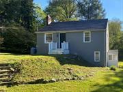 1940&rsquo;S Cottage Style Home on the edge of the village with .82 acres of open lawn area and mature trees. The lower level features a kitchen, dining room with a beamed ceiling, a cozy office, powder room and a laundry/utility room. The second floor is highlighted by a living room with wide board floors and a fireplace with an antique carved mantel, two bedrooms and a bathroom with a glass-enclosed shower. The walk-up attic level has been partially insulated, sheet rocked and electric. The property includes a garden shed/barn and a one-car garage. The fenced backyard, lawn area offers nice privacy. this home is convenient to dining, shopping, and just minutes from Amtrak, offering a balance of country charm and village convenience. Additional Information: ParkingFeatures:1 Car Detached,