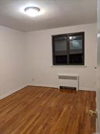 Cozy 1 bedroom and 1 bathroom apartment. Water, heat and hot water are included. Close to supermarket, school and public transportation. Q27, Q31 and Q76 buses nearby. Hardwood floor throughout. On site laundry room.