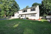 Welcome to this newly renovated Colonial featuring an enormous Great/Living Room of more than 1, 100 sq. feet. This awesome home is located walking distance to Greenwood Lake with all its shops, restaurants, and public transportation to NYC. Once inside you will be impressed by the gleaming wood floors in the living room that lead to the remodeled kitchen that boasts a center island, plenty of cabinets and countertop space where you can prepare meals for large gatherings served in your formal dining room. The kitchen has slider doors that lead out to the covered, oversized deck that overlooks your private and fenced in back yard. This unique designer home has Two Primary Bedrooms with Full Bathrooms. The oversized bedroom on the first floor can accommodate your largest furniture set. It also has an 9&rsquo;x11&rsquo; walk-in closet with a window, use it as a Study or add a Vanity/Make-up table. Come see this wonderful home and make it yours today.