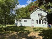 Step back in time to the 1860s with this charming, well-preserved home, lovingly cared for by the current owners for the past 39 years. Key updates include a durable metal roof and a new furnace, both installed in 2018, and a recently added hot water heater from 2022.  The original two-story structure boasts spacious rooms, and a thoughtfully designed living room addition (21x13) was incorporated in the 1960s. The expansive interiors and high ceilings are sure to impress.  While there&rsquo;s potential to modernize and harmonize this historic gem with the conveniences of the 21st century, it sits beautifully on a generous 1-acre lot.  Conveniently located near the Wassaic Train Station, the Harlem Valley Rail Trail, and the charming towns of Millerton, Millbrook, and Sharon and Kent, CT, this home is ideally situated.  The area offers vibrant farm markets, farm stands, and a variety of cultural and recreational activities, making Amenia a delightful place to call home.