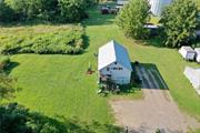 Charming Livingston Barn framed with flowing views of endless farmland and Catskill Mountain stunners. Fabulous investment property with one bedroom apartment on first floor, and 2 bedroom apartment on second floor. Nice level land to expand or develop. Each tenant pays their own utilities, and share common laundry room for convenience. Red Hook schools and Columbia County taxes this is the best deal around! 10 minutes to Hudson, Red Hook, or Germantown. Enjoy all the Hudson Valley has to offer!