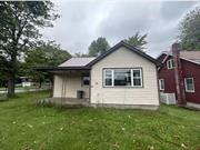 Opportunity knocks this 3 Bedroom 1 Bathroom home on a corner lot.. Partial basement, municipal water/sewer.