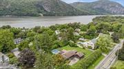 A rare find! Charming two bedroom, one and half bath ranch style home, on half an acre in the Village of Cold Spring, with 360 degree views of the Hudson Highlands. Enter home through the welcoming front porch, surrounded by hydrangeas, perfect for that morning cup of coffee, watching the sunrise. This home boasts mid century flair with its open floor plan, fun Orla Kiely textile wallpaper, Donald Kaufman color palette throughout, and custom mono stringer maple block staircase with Mylen steel balusters. Spacious living room with wood-burning Heatilator fireplace, handsome mantel, original built-in shelves, and picture window overlooking expansive yard with organic garden, patio, and beautiful chemical free in-ground pool with Ipe wood decking. Stunning level yard surrounded by Japanese maples, Russian sage, white cedar, hemlock and ornamental grasses. Open dining room with oversized French sliding doors leads to a screened porch for relaxing with a book, afternoon naps, al fresco dining, or taking in the Hudson Valley sunsets. Bright kitchen with induction stove top, double oven, commercial refrigerator and freezer, butcher block countertops and plenty of cabinets for storage. This home boasts two generously sized bedrooms and a flex space perfect for a den, guest area, or office. Full bathroom with Duravit double sinks, penny mosaic tiled walls, custom lighting, wet room with soaking tub, and private toilet room. Additional powder room also with Duravit sink and toilet. The lower level offers an additional 1, 000 square feet with fitness / recreation area, studio space, and laundry room with sink. Hardwood floors throughout. Whole house water filtration system. Two car garage. Perfect location with steps to hiking at Bull Hill / Hudson Highlands State Park Preserve, Little Stony Point, the Hudson River, West Point Foundry Preserve,  Main Street&rsquo;s restaurants and shops, and Metro North for easy access to NYC.