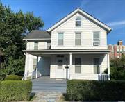 Welcome to this charming 3-bedroom, 2-bath home located in the heart of Oyster Bay. As you step onto the gracious wrap-around front porch, you&rsquo;ll be greeted by the warmth and character of this inviting property. The main floor features a cozy living room, a formal dining room, and a spacious eat-in kitchen, perfect for gatherings. The oversized laundry/mudroom offers convenience and ample storage with a large walk-in closet. Upstairs, you&rsquo;ll find three comfortable bedrooms and a full bath. The home also boasts a full, unfinished basement, equipped with utilities, additional storage space, a second refrigerator, and a new dehumidifier. Four window A/C units, ceiling fans, and wall-to-wall carpeting add to the comfort of the home. The property includes one parking spot in the driveway, with ample street parking available. Please note, there is an easement for the owner&rsquo;s use of the driveway and landlord performs all yard work and snow removal of driveway.Tenant responsibilities include paying for gas, electric, water, and cable and sidewalk snow removal .