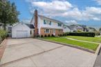 Large Fully Dormer Cape in the Village of Westbury, 6 Large Bed Rooms, 2 Full Bathrooms Full Basement with Outside Entrance, Lot is 80x100, Large driveway for 6 Cars, Fully Fenced back yard, Many Updates, New solar system , 4 Zone sprinklers system , close to shopping and the LIRR, Gas cooking.